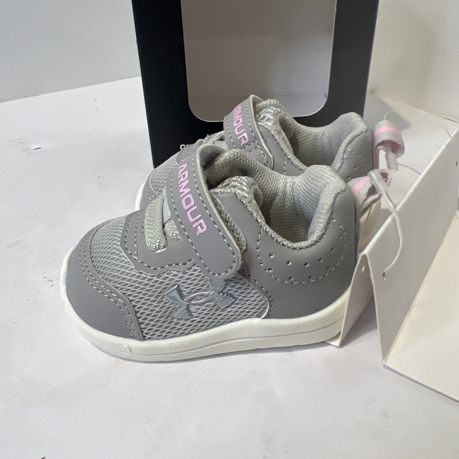 Size 2c - Pink Under Armor Tennis Shoes
