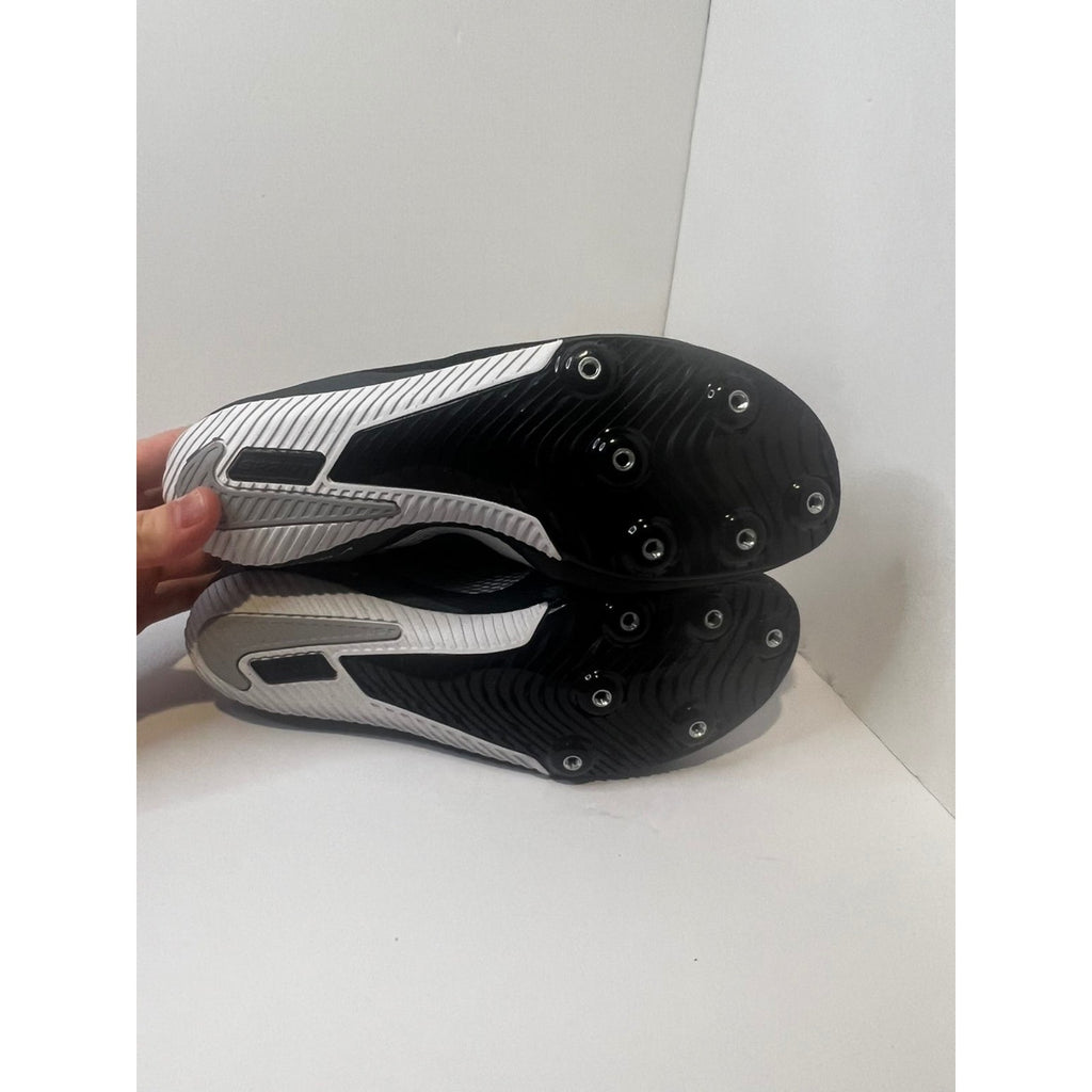 Size 9.5 Mens- Nike track shoes