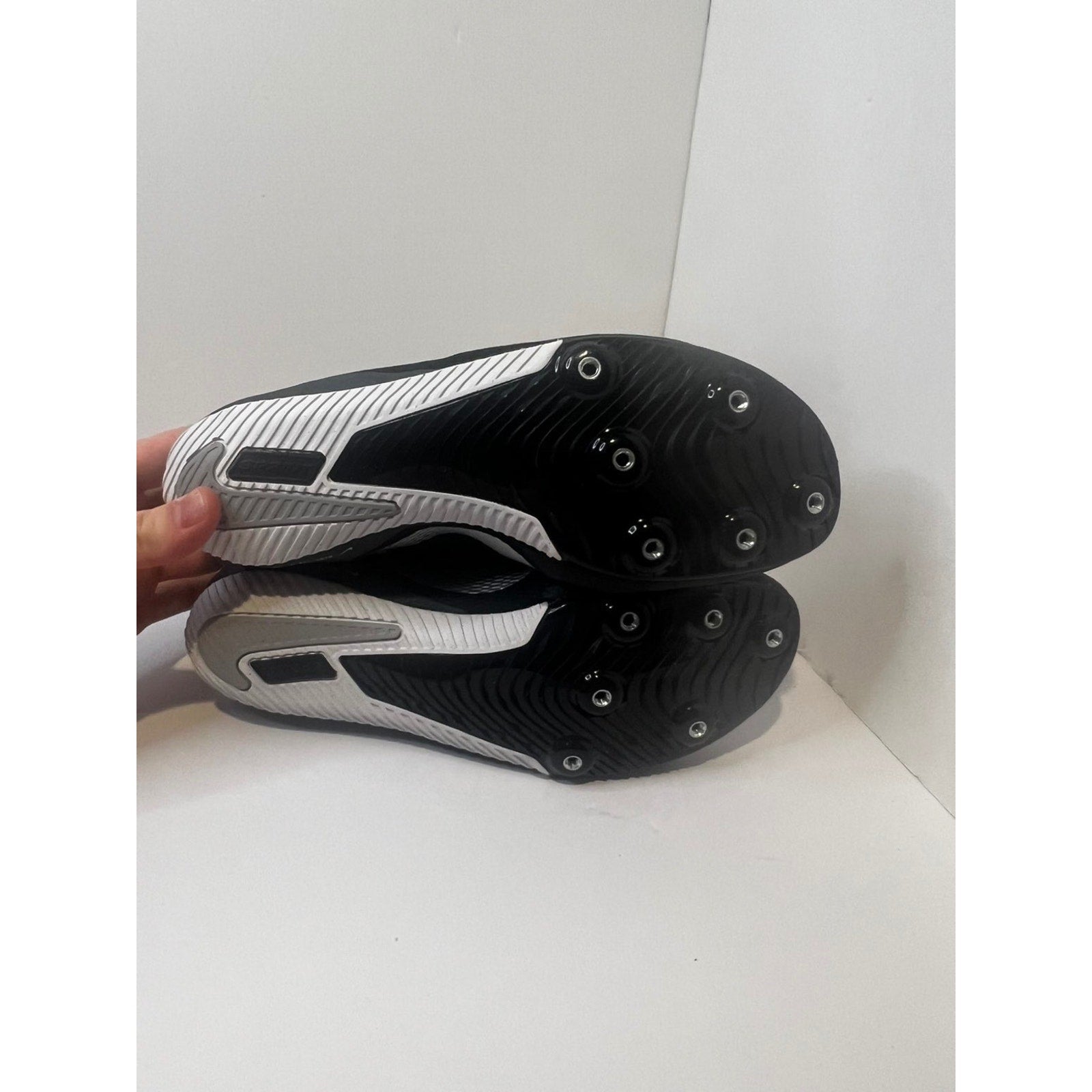 Size 9.5 Mens- Nike track shoes