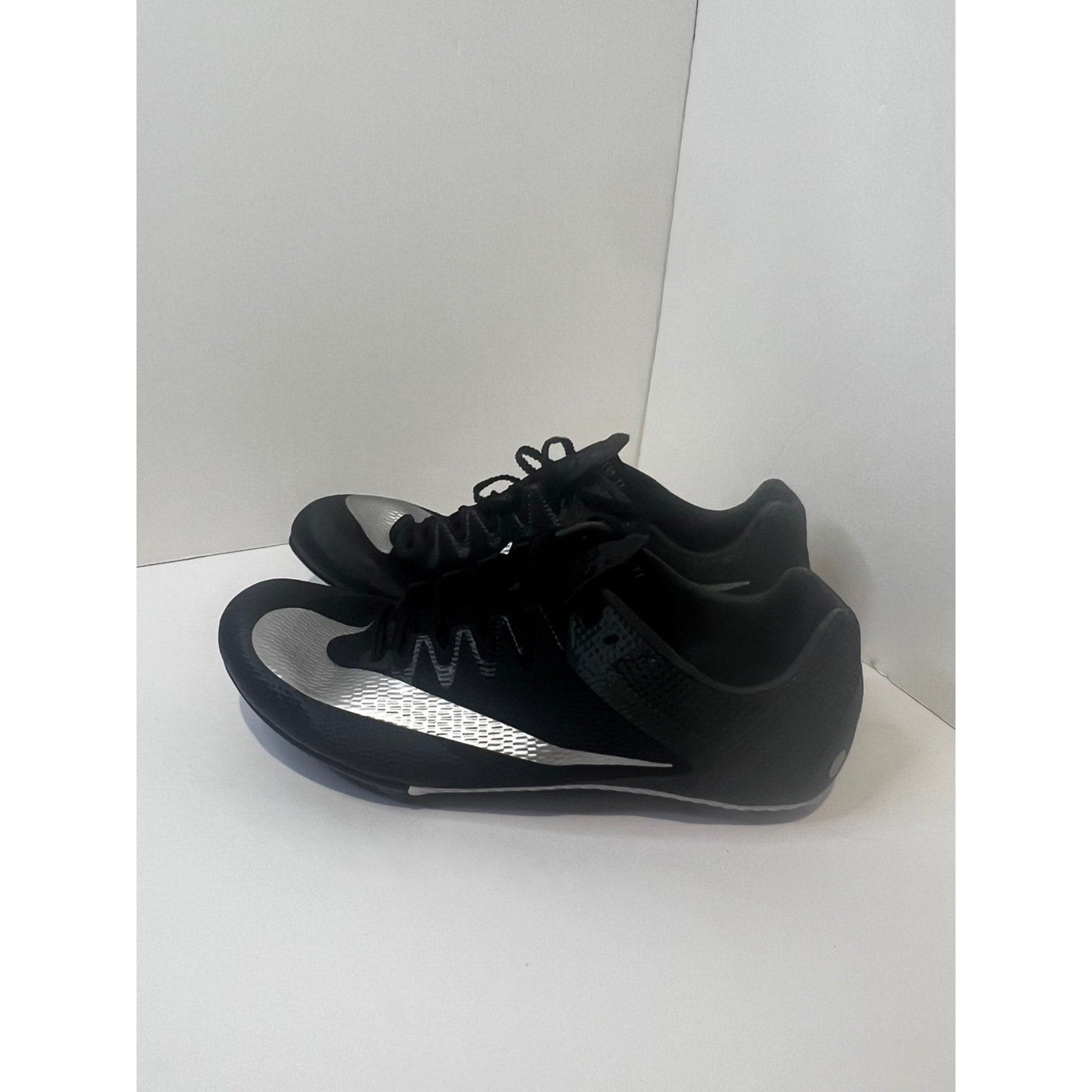 Size 9.5 Mens- Nike track shoes